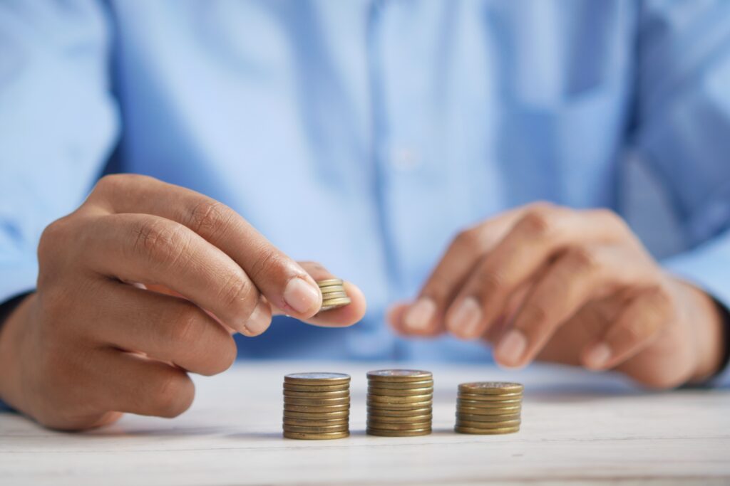 Image of man counting coins